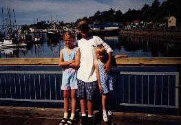 Jamie, DC and Mariah on the docks  in Newport Oregon 97